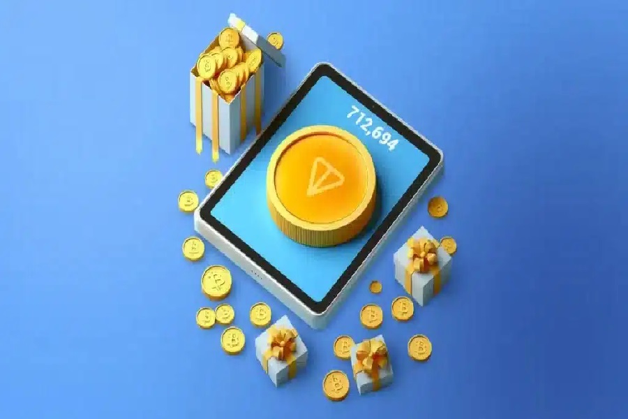 نماد سهبعدی بازی تلگرامی Notcoin روی تبلت به همراه جعبههای هدیه